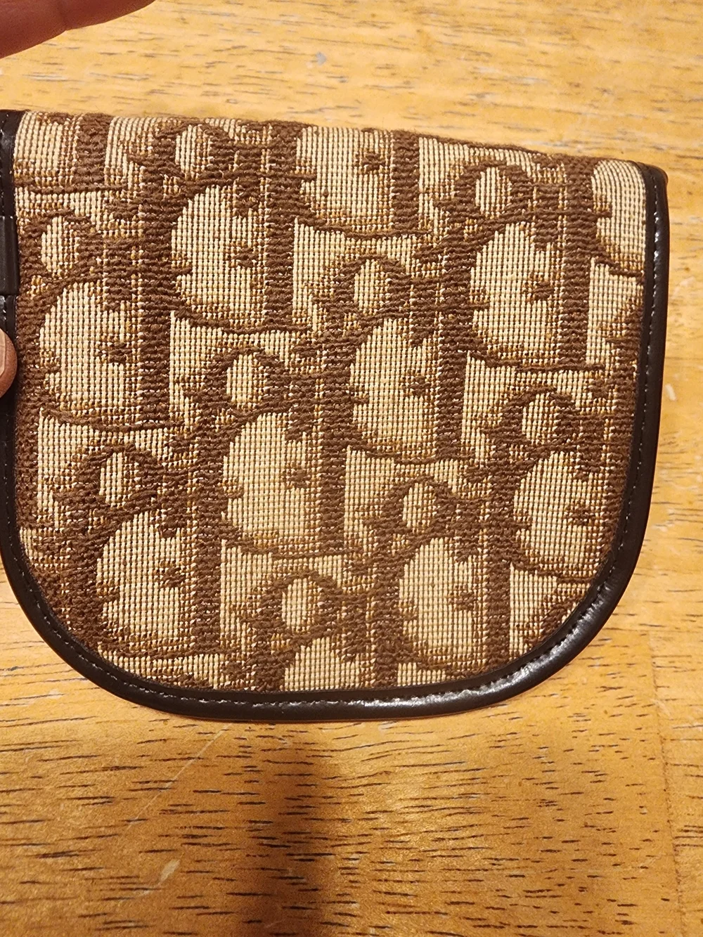 vintage Christian Dior coin purse features the iconic brown Trotter canvas mono